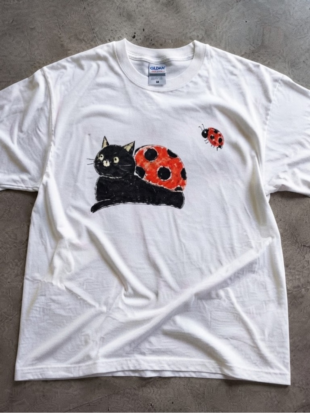 Gildan White Tee with Black Cat and Red Ladybug Graphic